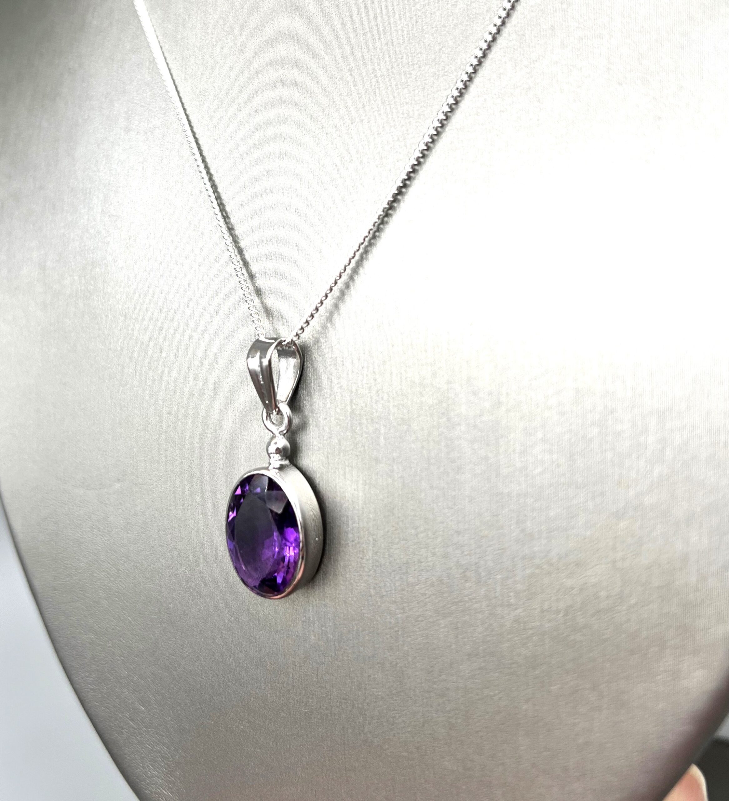 Medium size oval purple stone